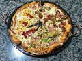 PIZZAS E PICANHAS: A BRASA FORNO À LENHA 